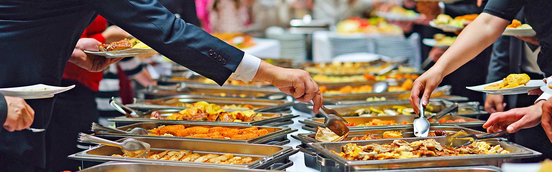 Buffet style catering image showing chaffing disshes