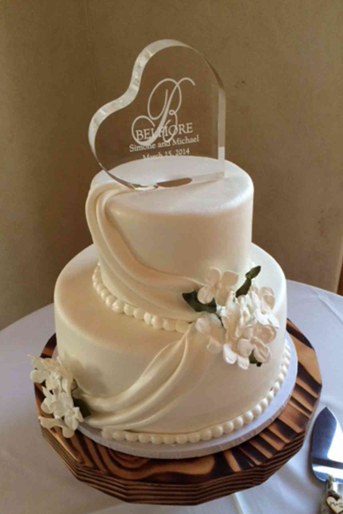 White Drapes Elegant Wedding Cake 